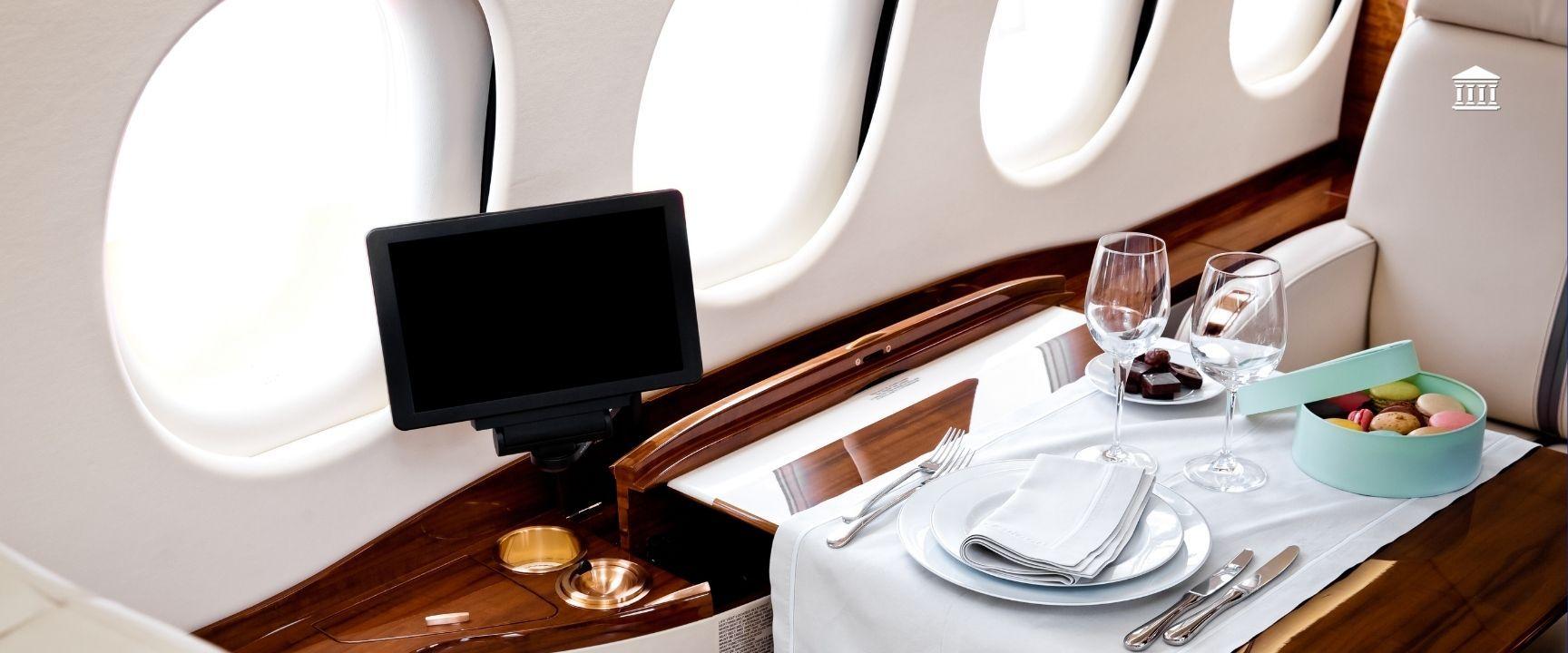 A business class seat in an airplane