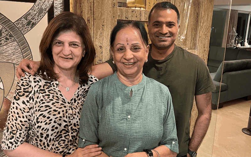 Group portrait of older adults standing together, featured in a client testimonial about secure and simplified real estate investing